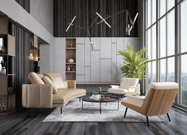 Salon moderne avec canapé et chaises beiges, table basse ronde, grande plante d'intérieur, luminaire géométrique, fenêtres allant du sol au plafond, sol en bois foncé et mur d'accentuation gris.