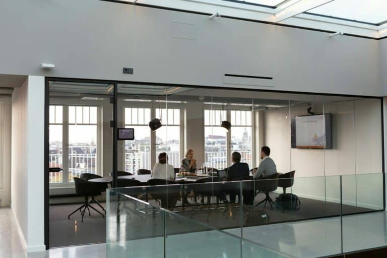 people sitting on chair inside building