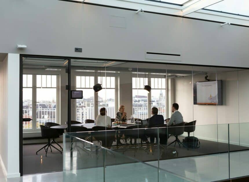 people sitting on chair inside building