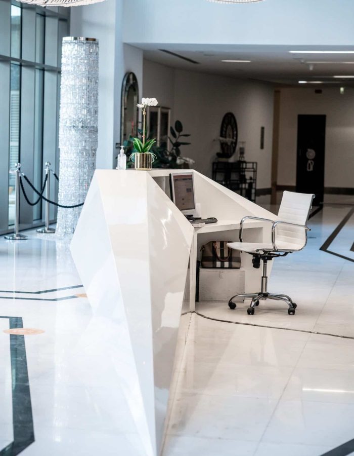 sleek-reception-area-with-geometric-desk-design-2026-01-06-11-07-48-utc